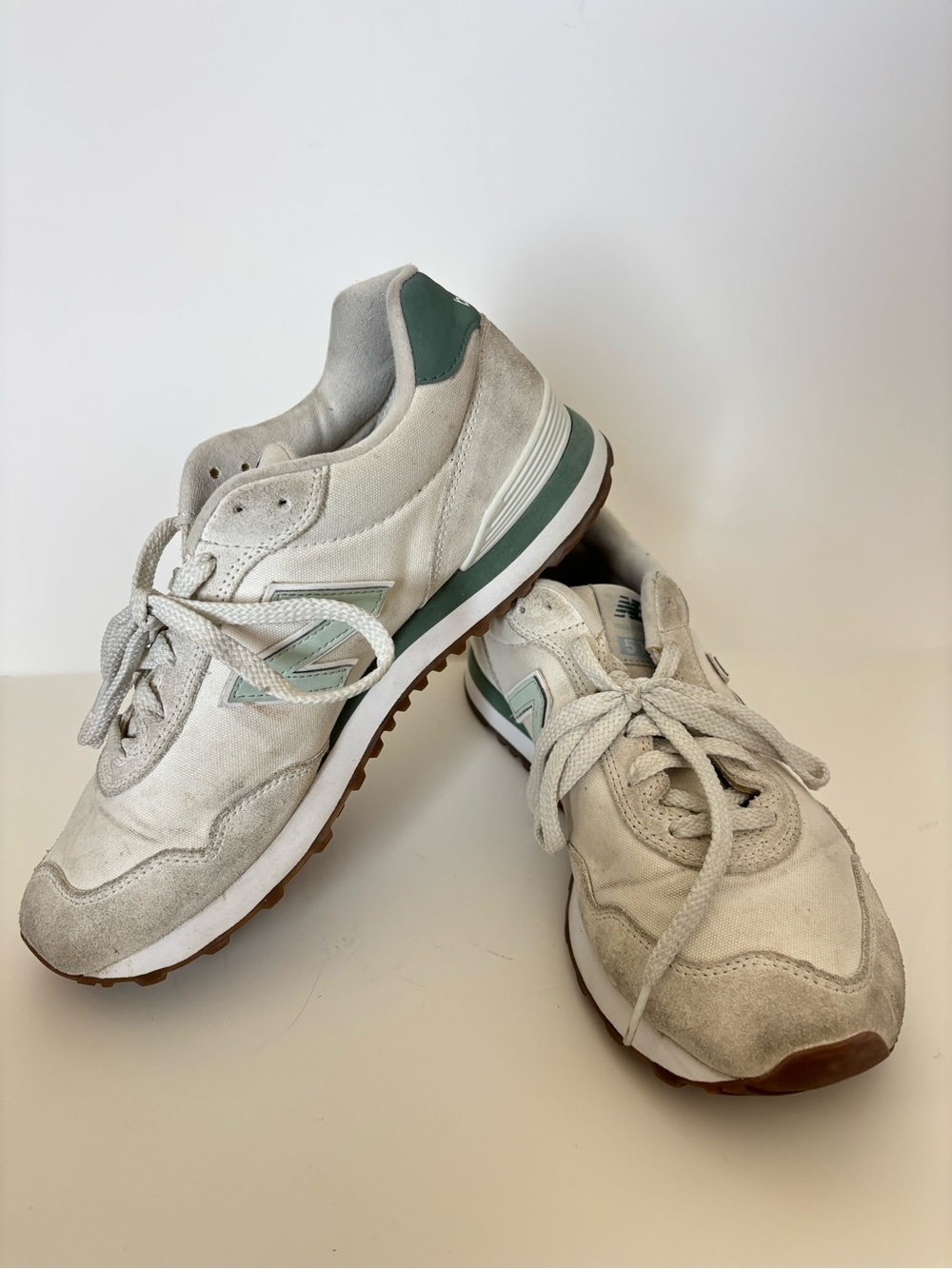 New Balance men’s White and Sage Green Suede Mesh Sneakers